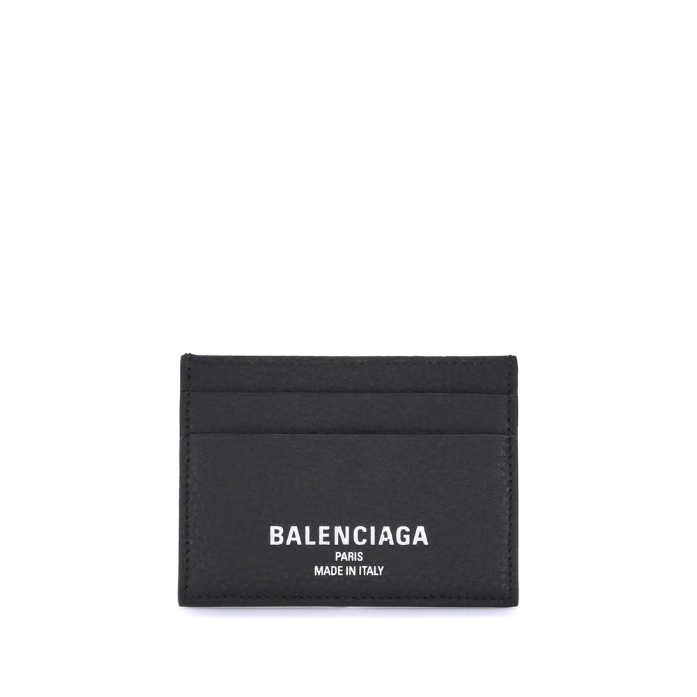 Black Balenciaga Lamb Ovis Aries wallet with sleek design and textured leather, featuring multiple card slots and a zip coin compartment.
