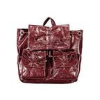 Desigual burgundy polyurethane women's backpack with adjustable straps and front zipper pocket, stylish and functional.