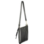 Black leather Coccinelle women's handbag with sleek design and silver hardware, featuring top handles and a spacious interior.