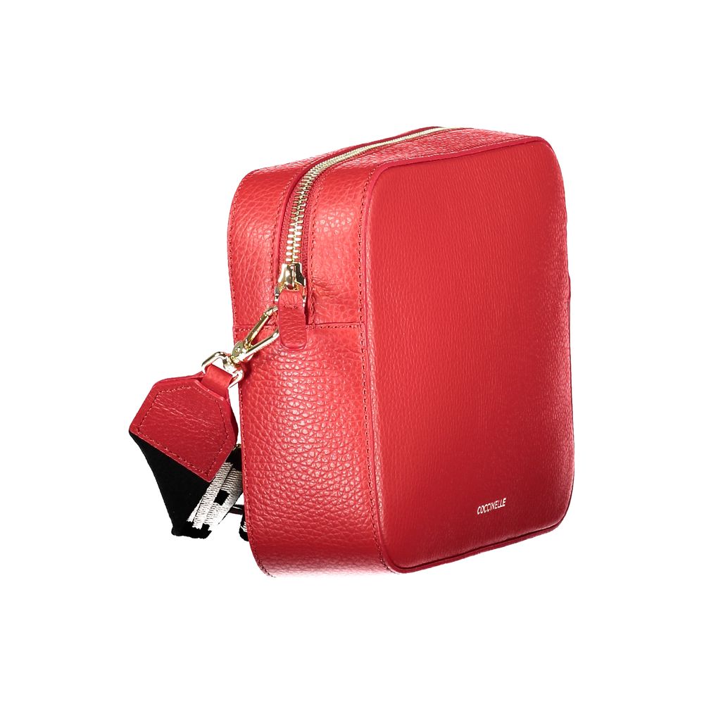 Coccinelle Rosso leather women's handbag with top handle and gold-tone hardware, stylish and spacious for everyday use.
