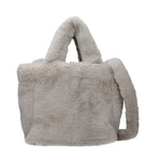 Herno gray fur handbag with sleek design, featuring a stylish handle and soft textured fur exterior.