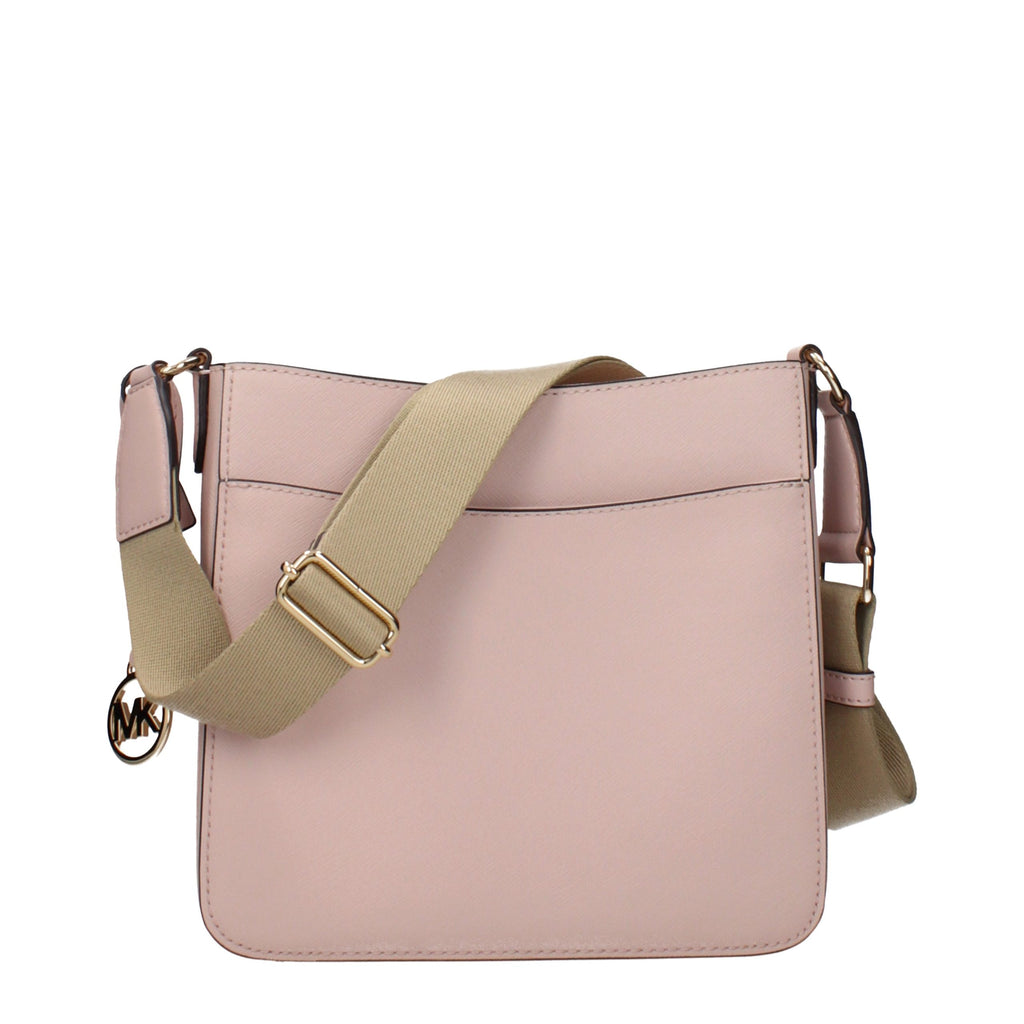 Michael Kors pink leather shoulder bag with gold hardware, featuring a sleek design and adjustable strap.