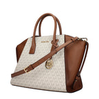 Beige fabric Michael Kors handbag with structured design and top handle, featuring subtle branding and elegant stitching.