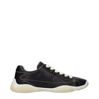 Prada black leather sneakers with sleek design, featuring Prada branding and white rubber soles.