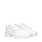 Prada white fabric low top sneakers with sleek design and white laces, perfect for casual and stylish footwear.