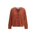 Brunello Cucinelli orange cashmere cardigan displayed flat with button details and soft, luxurious fabric.