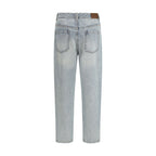 Brunello Cucinelli blue cotton straight-leg jeans displayed on a hanger, showcasing classic fit and clean design.