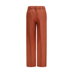 Brunello Cucinelli red linen casual pants with a relaxed fit and adjustable drawstring waist, ideal for comfortable everyday wear.