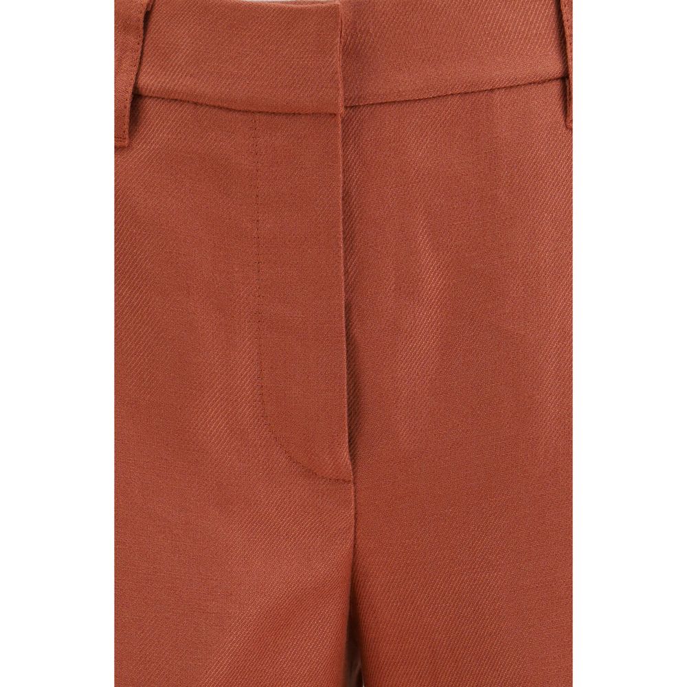 Brunello Cucinelli red linen casual pants with relaxed fit, featuring a comfortable waistband and tailored design for everyday wear.