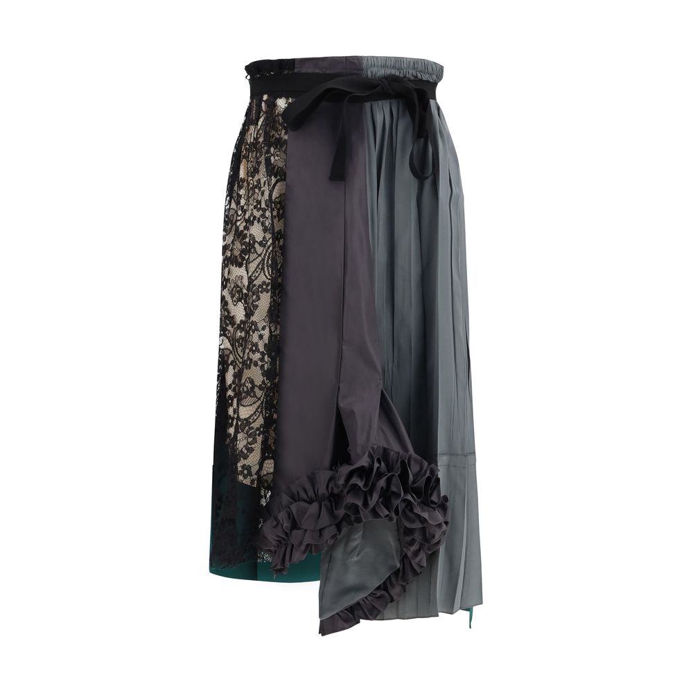 Prada multicolor silk midi skirt with a vibrant pattern and flowing design, shown on a model against a neutral background.