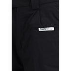 Black cotton Bermuda shorts by GCDS with a relaxed fit, featuring a casual design and subtle brand logo detail.