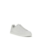 Dolce & Gabbana white calf leather Bos Taurus low top sneakers with sleek design and subtle branding.