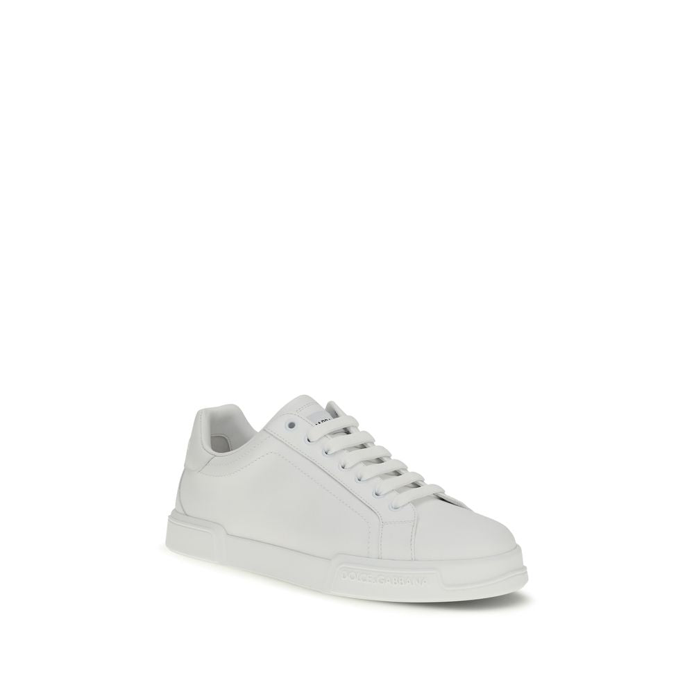 Dolce & Gabbana white calf leather Bos Taurus low top sneakers with sleek design and subtle branding.