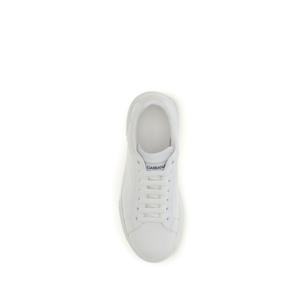 Dolce & Gabbana white calf leather Bos Taurus low top sneakers with classic design and lace-up closure.