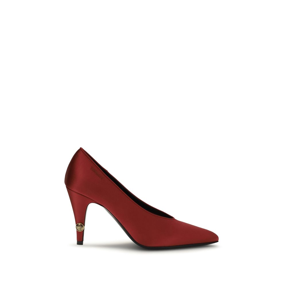 Versace red viscose high heel pumps with pointed toes and sleek design, perfect for elegant and stylish footwear.