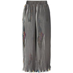 Black polyester women's skirt by Desigual with a flowing design and subtle pattern, suitable for casual or dressy occasions.
