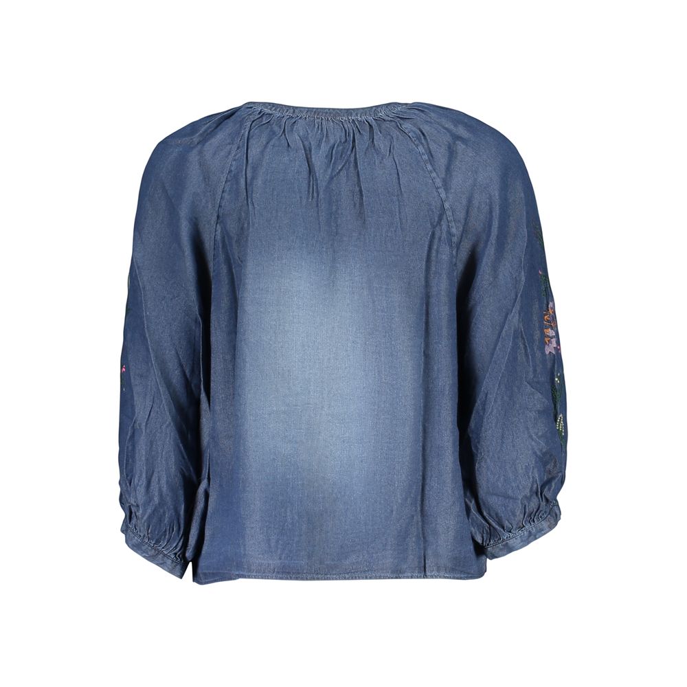 Desigual blue lyocell women's shirt with relaxed fit and casual style, featuring a button-down front and long sleeves.