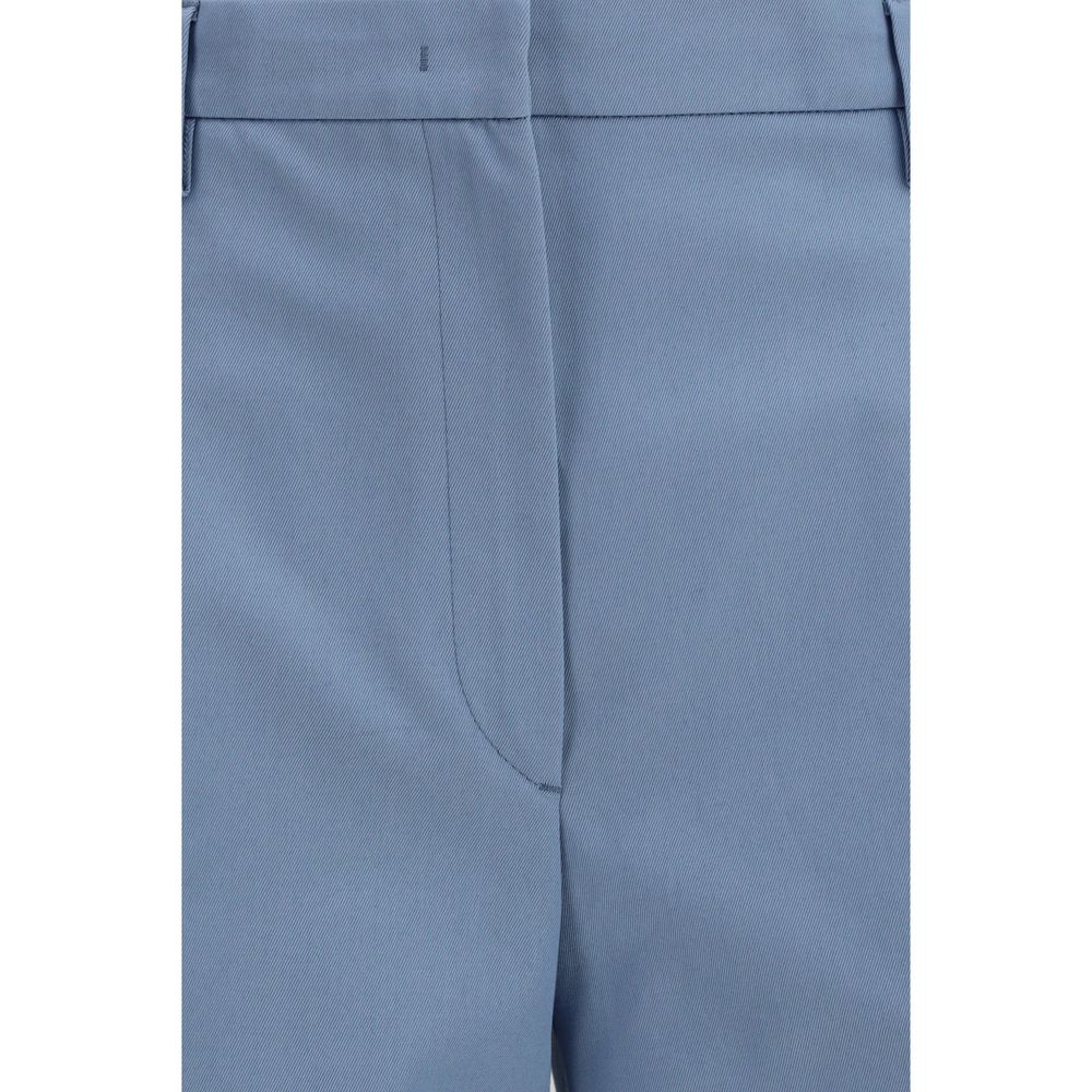 Prada blue cotton chino pants with a tailored fit, front pockets, and belt loops, suitable for casual or smart-casual wear.