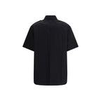 Prada black cotton short-sleeve shirt with a classic collar and button-front design, displayed flat on a neutral background.