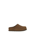 UGG brown calf leather Bos Taurus mules with ankle strap and pointed toe, stylish slip-on footwear for women.