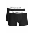 Black cotton men's boxer briefs by Trussardi, featuring a snug fit and elastic waistband, displayed on a neutral background.
