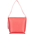 Coccinelle Rosso leather woman handbag with top handle and silver hardware on a plain background.