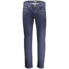 Guess Jeans men's blue cotton jeans displayed on a model, showcasing classic fit and denim texture.