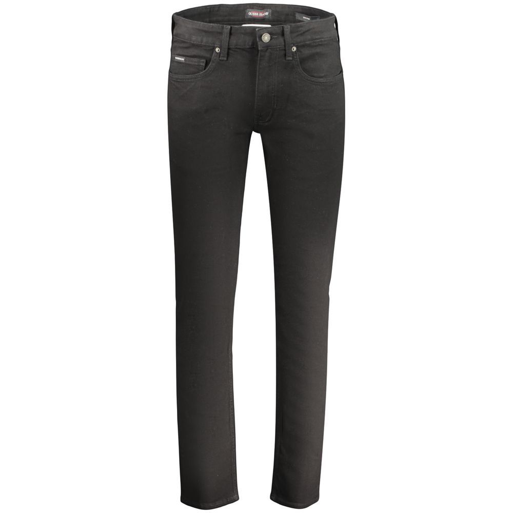 Black cotton men's jeans by Guess Jeans, showing a close-up of the fitted denim fabric and classic five-pocket design.