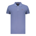 Men's blue cotton polo shirt by Norway 1963 featuring a classic fit and subtle branding, displayed on a mannequin.