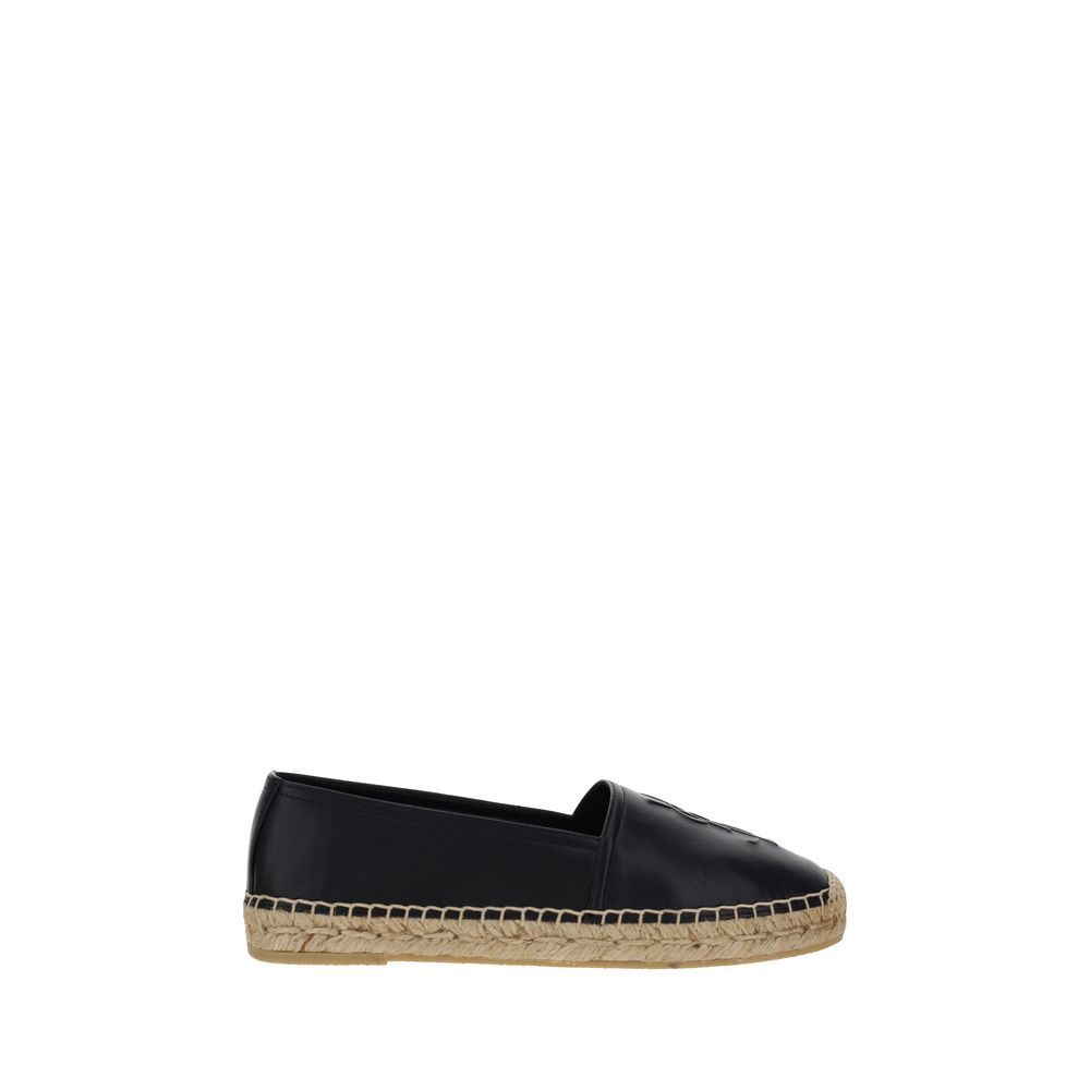 Saint Laurent black lamb leather Ovis Aries espadrilles with woven fabric soles and sleek slip-on design.