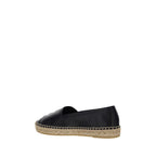 Saint Laurent black lamb leather Ovis Aries espadrilles with woven jute soles, stylish slip-on footwear for women.