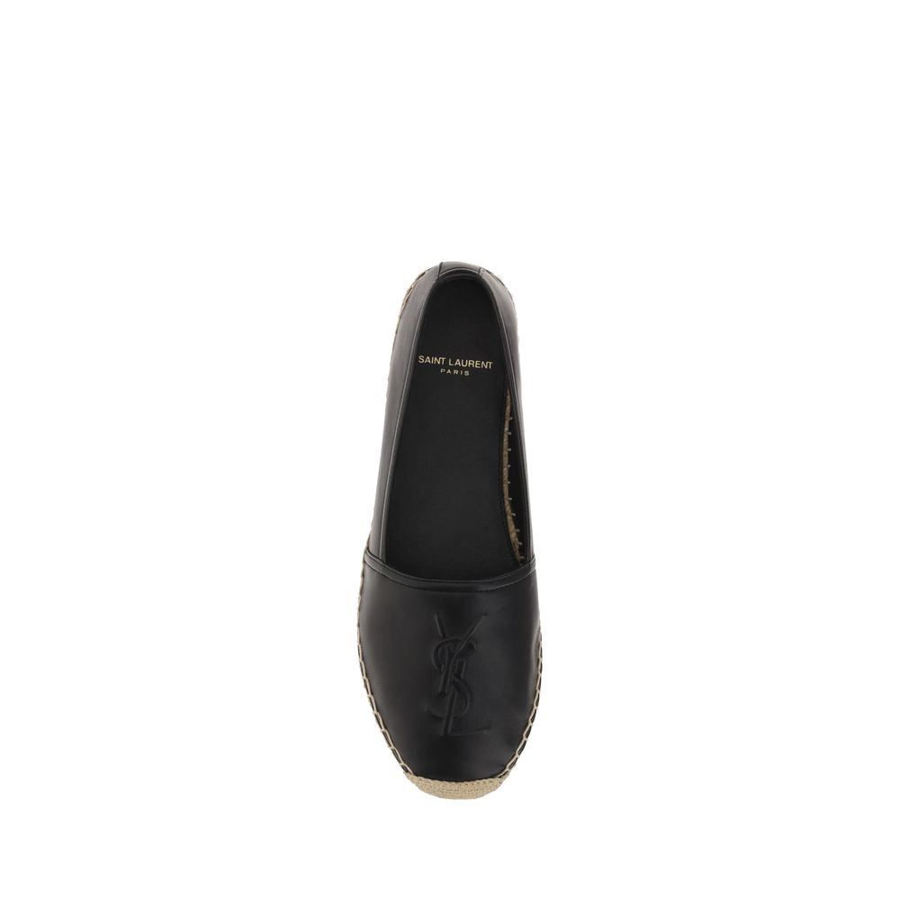Saint Laurent Black Lamb Ovis Aries Espadrilles featuring a woven jute sole and sleek leather upper for stylish summer wear.