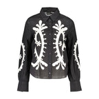 Desigual Nero cotton women’s shirt featuring a casual fit with long sleeves and a stylish, modern design.