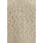 Beige silk sleeveless sweater by Brunello Cucinelli, close-up showing smooth fabric and elegant design.