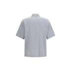 Sunflower blue cotton shirt with sunflower and floral pattern, featuring a button-up design and long sleeves.