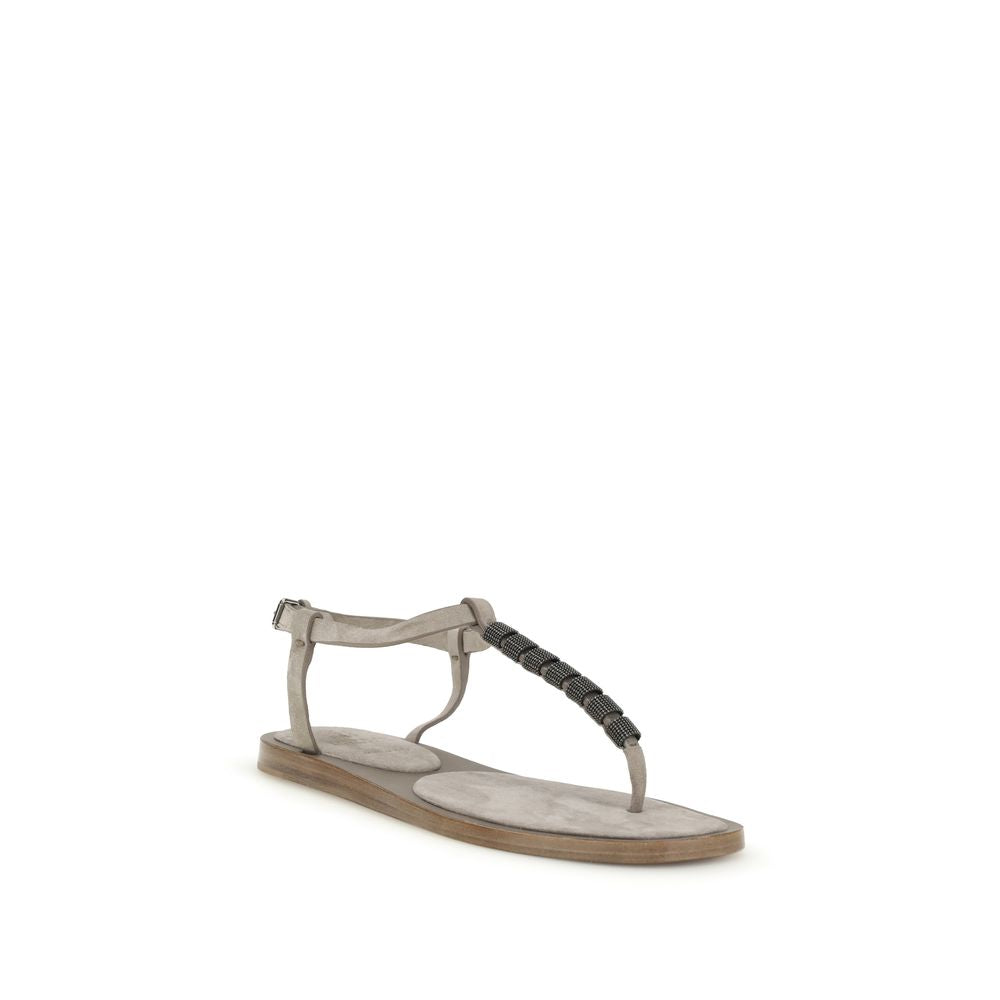 Beige calf leather Brunello Cucinelli Bos Taurus flat sandals with open toe and ankle strap on a neutral background.