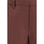 Brunello Cucinelli brown linen casual pants displayed on a hanger, showcasing relaxed fit and lightweight fabric.