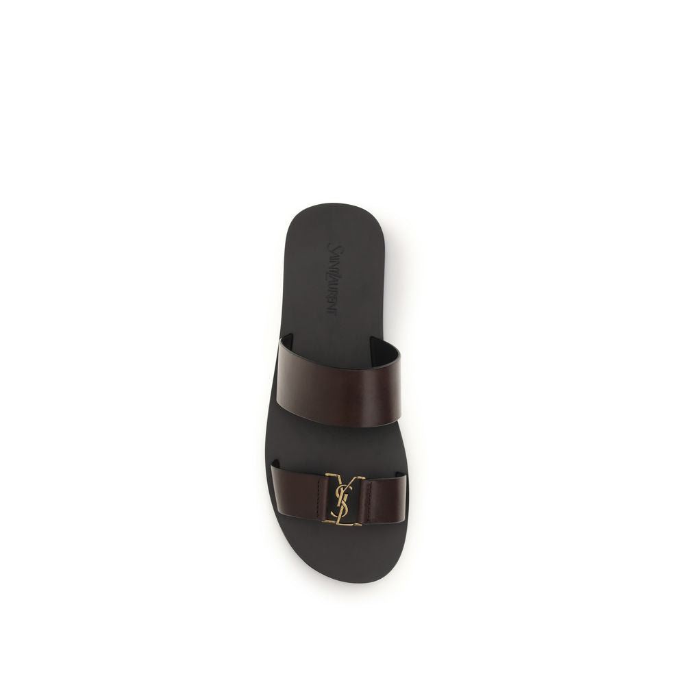 Saint Laurent brown calf leather Bos Taurus flat sandals with open toes and ankle straps.