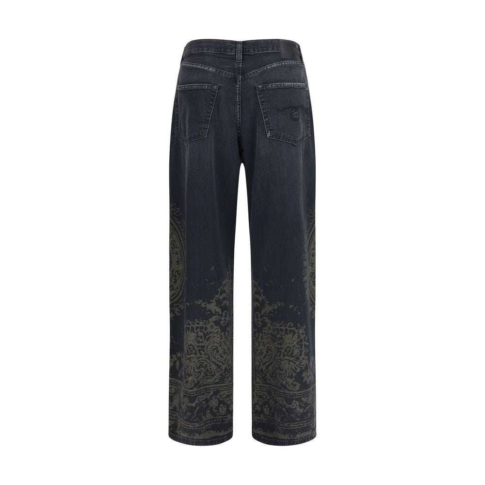 R13 black cotton denim jeans with a slim fit and classic five-pocket design, shown on a model.