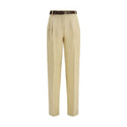Max Mara beige linen casual pants with relaxed fit and elastic waistband, shown on a model.