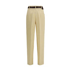 Max Mara beige linen casual pants with a relaxed fit and side pockets, perfect for comfortable everyday wear.