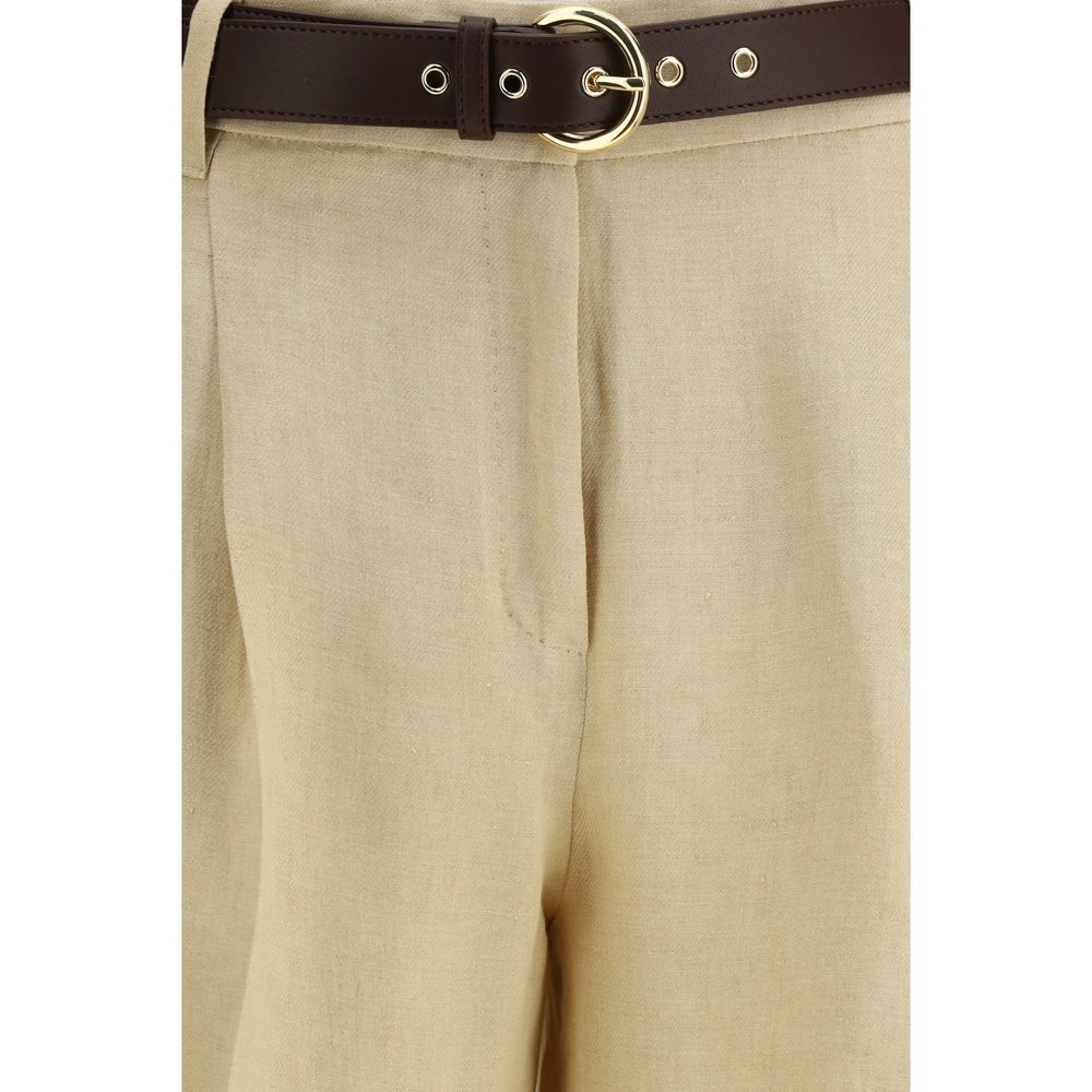 Max Mara beige linen casual pants displayed on a model, featuring a relaxed fit and lightweight fabric for comfortable summer wear.