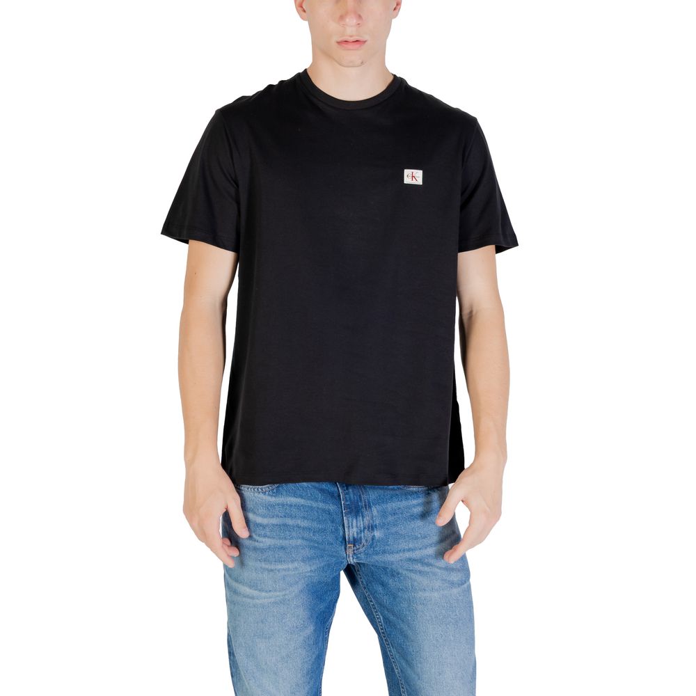 Black cotton T-shirt from Calvin Klein Jeans featuring a classic crew neck and minimalist logo detail.