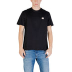 Black cotton T-shirt from Calvin Klein Jeans featuring a classic crew neck and minimalist logo detail.