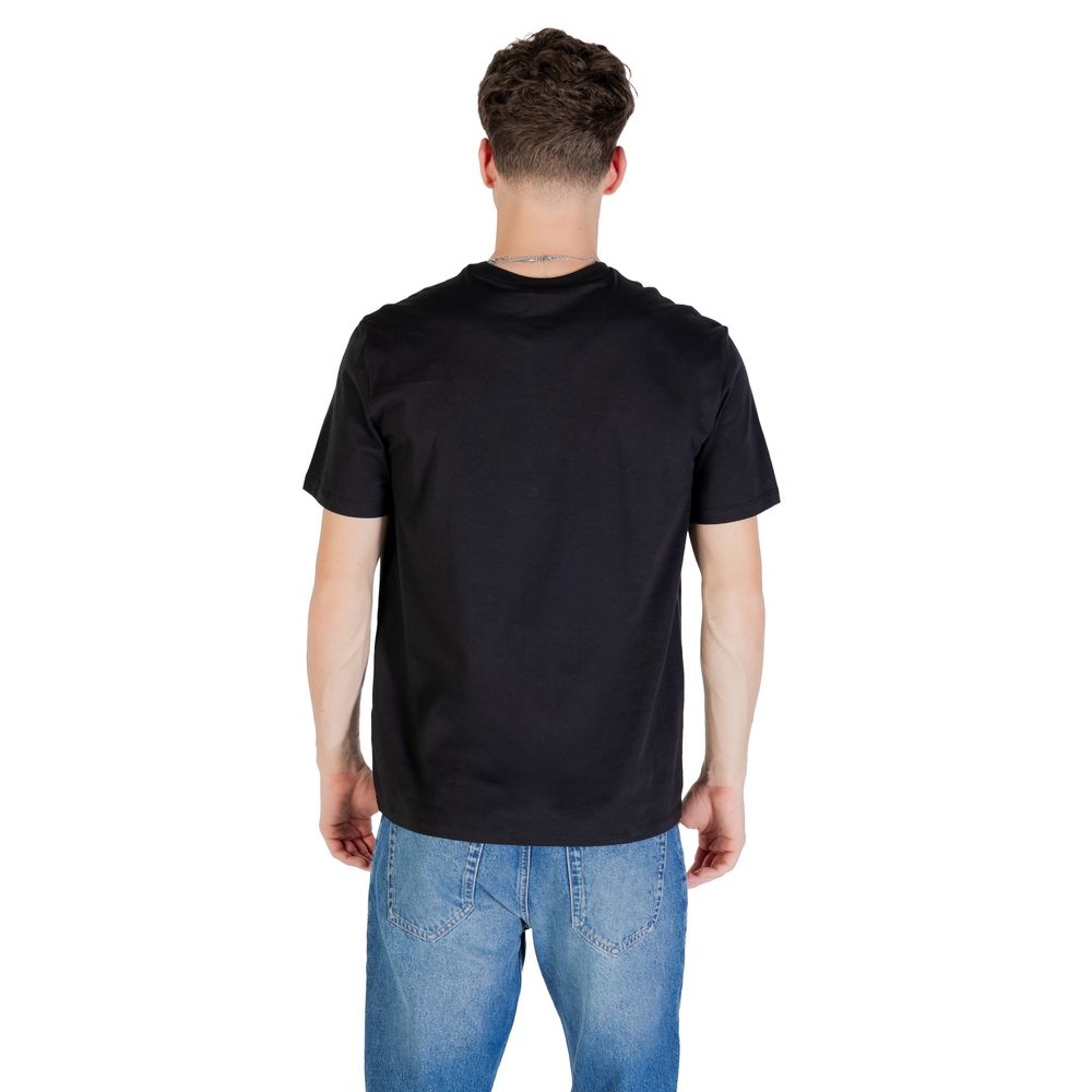 Black cotton T-shirt from Calvin Klein Jeans with logo detail, displayed flat on a neutral background.