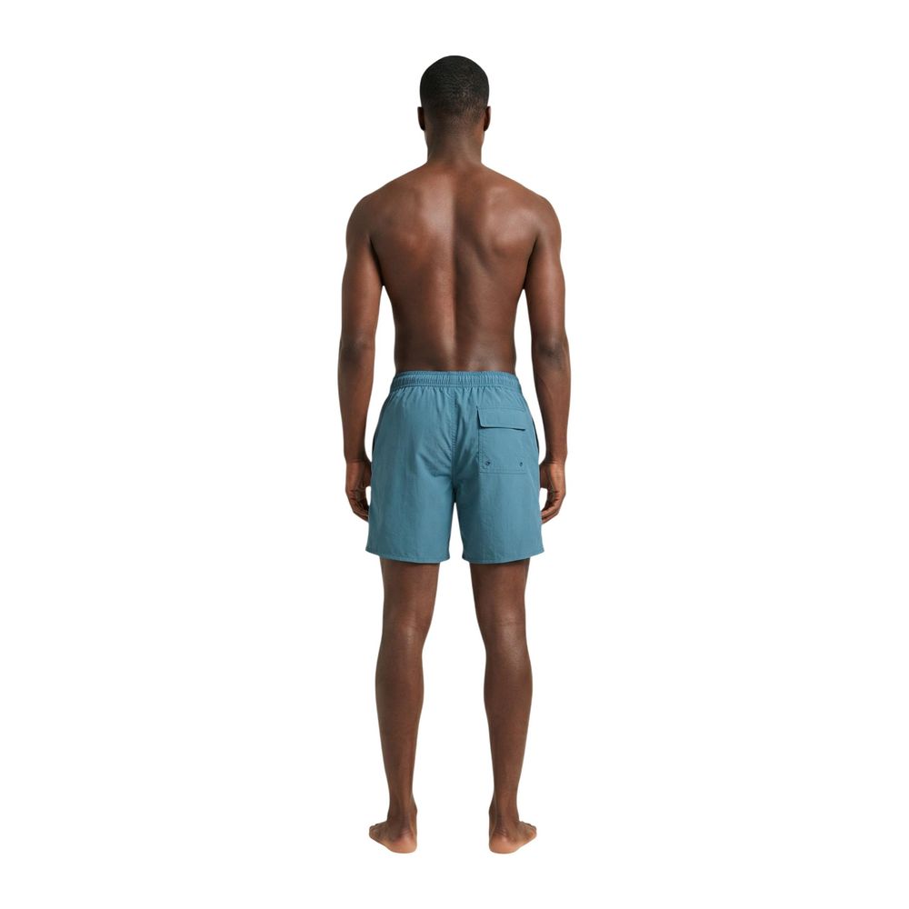 Lyle & Scott blue polyamide swim shorts with elastic waistband and side pockets, designed for beach and pool activities.