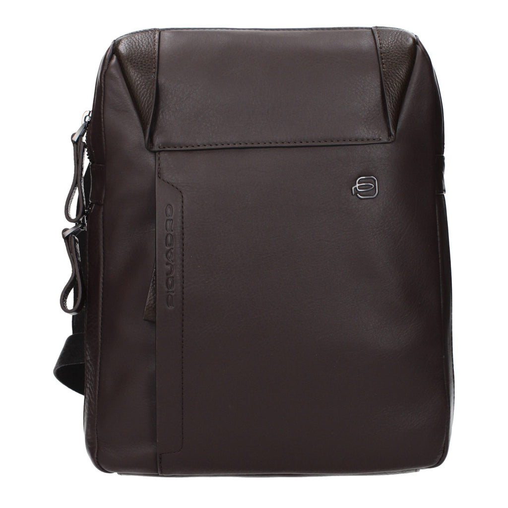 Brown leather crossbody bag by Piquadro with adjustable strap and sleek design, perfect for everyday use.