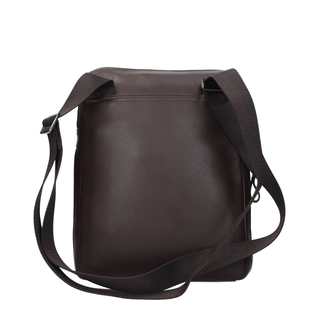 Brown leather Piquadro crossbody bag with adjustable strap and sleek design, ideal for everyday use and organization.