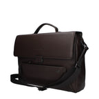 Piquadro brown leather business and laptop bag with adjustable shoulder strap and multiple compartments for organization.