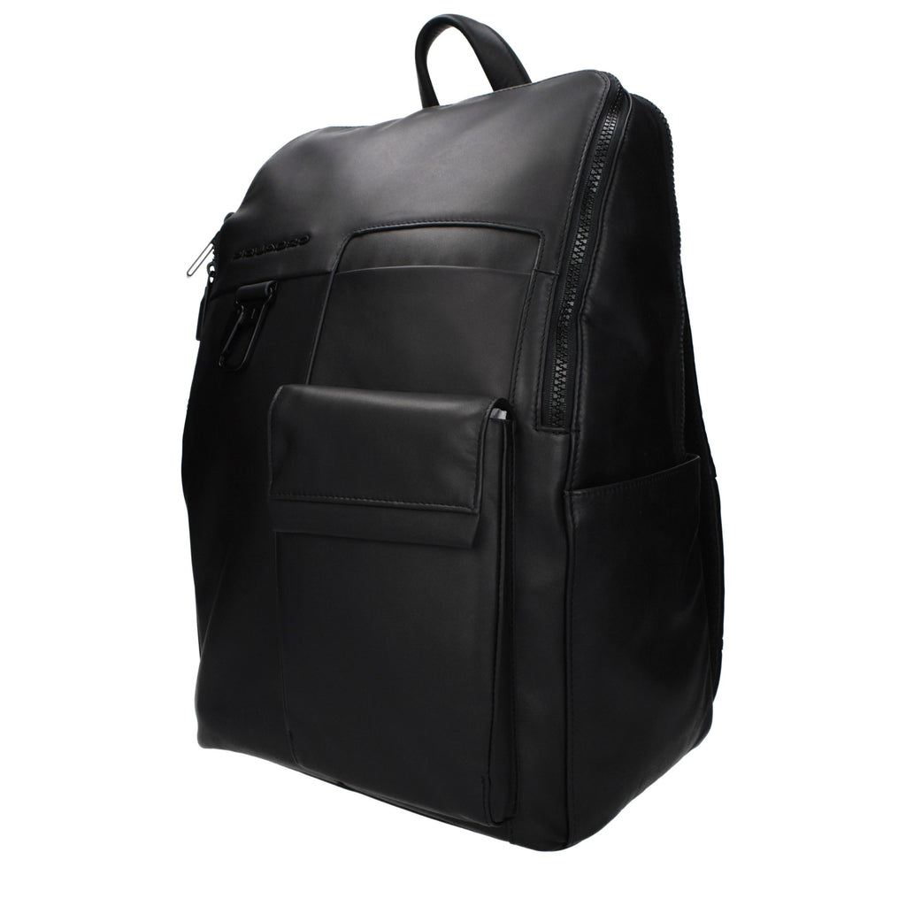 Piquadro black leather backpack with multiple compartments and adjustable straps, stylish and durable for everyday use.